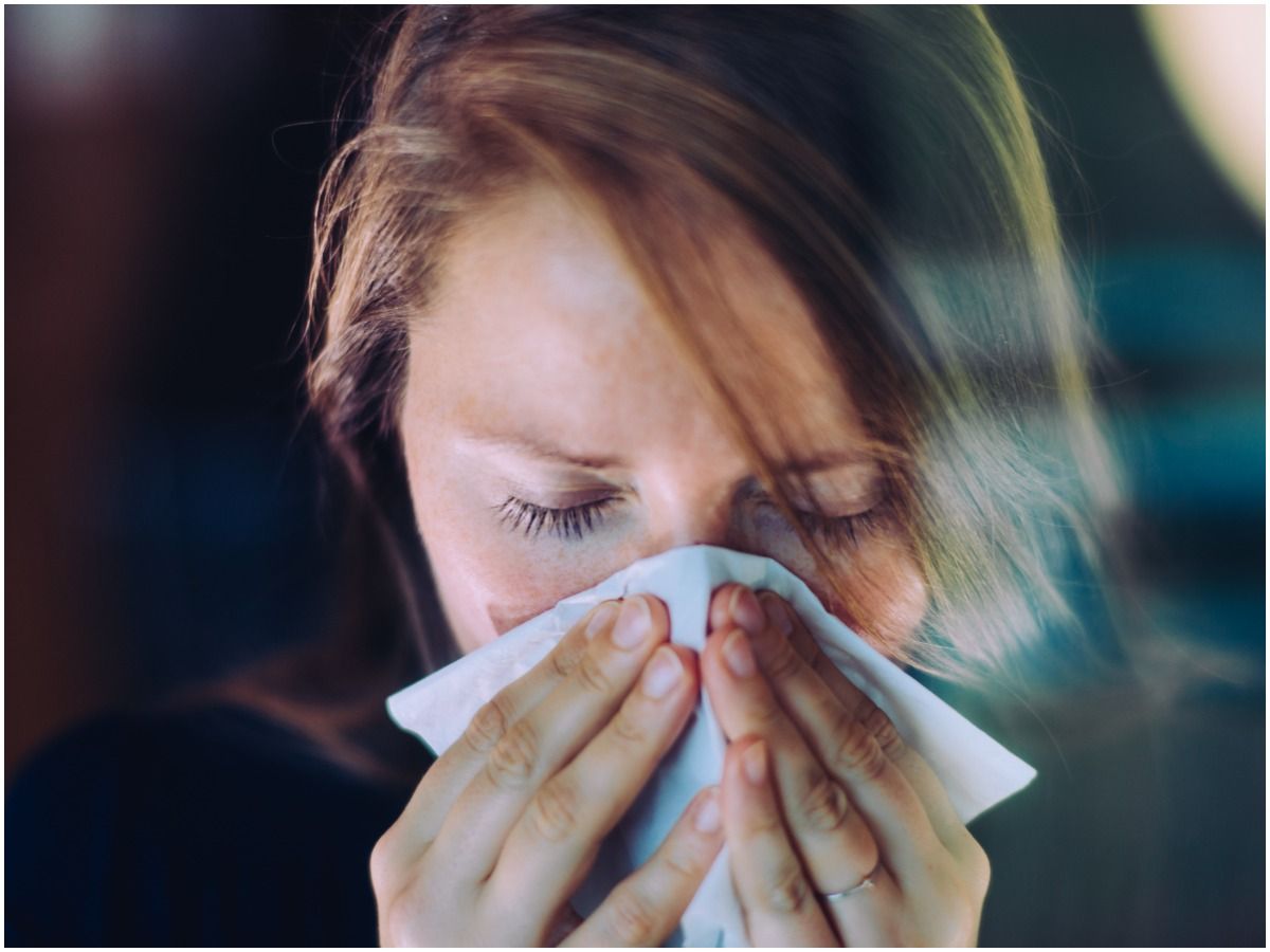 4 Reasons Why Your Sneeze Smells & What It Means For Your Health